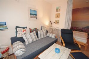 Wohnzimmer mit zusätzlicher Schlafcouch