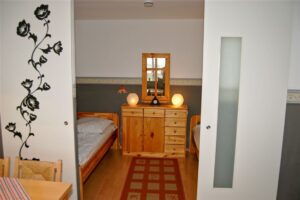 Schlafbereich mit Schiebetür